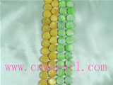 plated yellow and green button shell strands